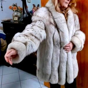 Pre-owned, elegant blue fox fur jacket.